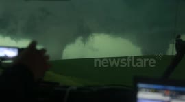 Shots of historic twin tornadoes.