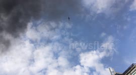 fire by white city helicopter circling