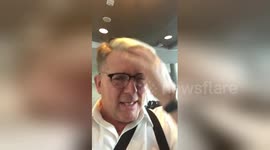 Dismayed passenger removed from flight due to 'two very large people'