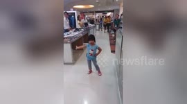 Toddler brings supermarket to a standstill with adorable dance moves