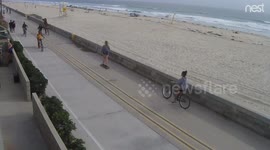 Guy crashes but doesn't spill his beer!