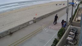 Dude drops cash, no one notices.