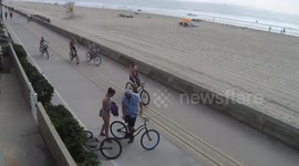 'I'll help. First, take your dress off!' Passerby comes to woman's aid after skirt gets caught in bike chain