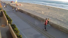 Dude shows off on skateboard and crashes