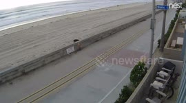 Man on roller blades crashes hard and spills his coffee.