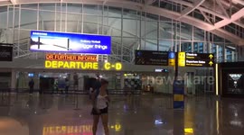 Empty departure gate at Bali airport after volcano eruption