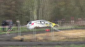 Rally car off slippery road , or too much power??