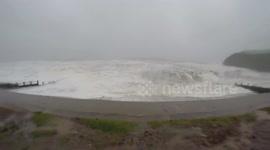 GoPro footage up close to high waves and stormy seas. Shot at St Bees, Camera man gets wet from large wave