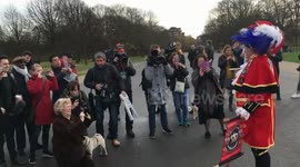 Prince Harry and Meghan Markle hear joyfull proclamations by Royalist Town Crier (2/3)