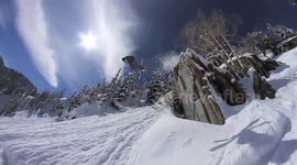 Skier falls off cliff into snow abyss