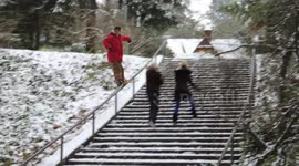 Pedestrians and skier surprise each other