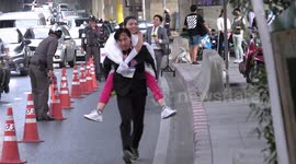 Hundreds of couples compete in Bangkok's Running of the Brides