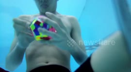 Man solves 12-sided Rubik’s cube underwater in one breath