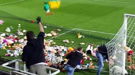 Charleroi fans throw cuddly toys onto pitch for underprivileged children