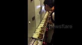 Flight attendant suspended for eating leftover meal on plane