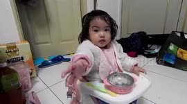 baby is using yogurt for not just eating but also for facial and hair treatment part  1