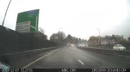 Crazy truck driver places a pallet standing up on a exit lane from a duel carriage way. He should have used a warning triangle . So so dangerous seen it last moment