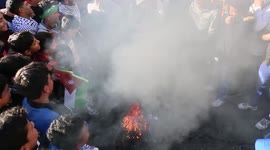 Jordanians burn Israeli flags in protest after prayers
