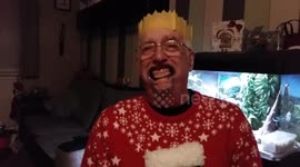 Old man's false teeth fall out playing Speak Out