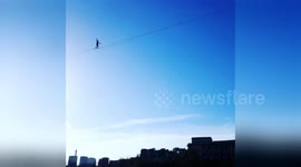 French slackliner walks from Eiffel Tower in Paris