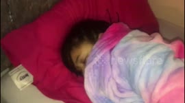 Mum wakes daughter up to tell her its snowing