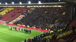 Huddersfield's players celebrate with their fans
