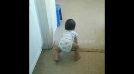 Baby boy crawls like a monkey