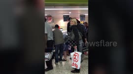 Shoppers wrestled on the floor of a supermarket while scrambling for cut-price food.