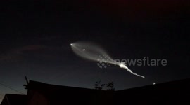 Rocket launch across San Diego sky