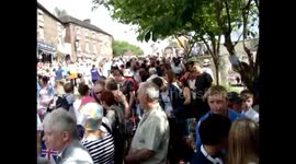 Olympic Flame 2012 arrives at the famous  Ironbridge Telford Shropshire with music