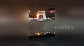 Duo hitch ride on back of Staten Island bus