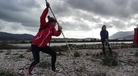 Mum Hits Dad with Makeshift Javelin on Beach