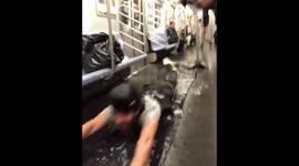 Pranksters use New York subway car to 'slip and slide'