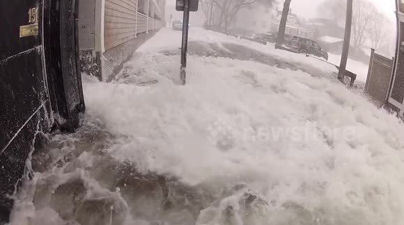 Cameraman takes direct hit in Massachusetts floods