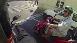 Famous actor lookalike on a scooter