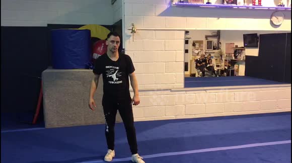 Gainer switch swing through Boxcutter kick, Martial arts tricking Perry Flowers