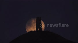 Supermoon rising behind Glastonbury Tor, New Year's Day 2018