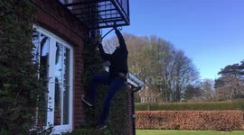 Friend trying to get into our holiday house when we lost the key