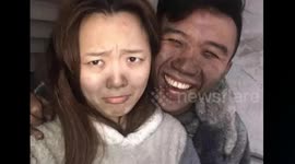 桂林 情侣家中失火后玩自拍：祝红红火火