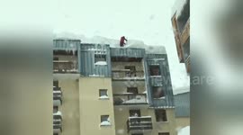 Man shovels snow off roof in French Alps resort where Briton went missing