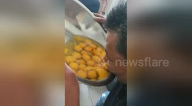 Man drinks 50 raw eggs after betting with friend