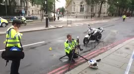 police photographers at the scene of accident at Embankment