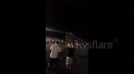 People sneaking into festival (edit)