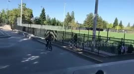 BMX guy tries to jump over a fence and get stacked \ crash