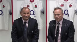 Eddie Jones poses for photos after signing a new contract with England