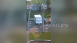 Strong winds topple truck in Netherlands storm