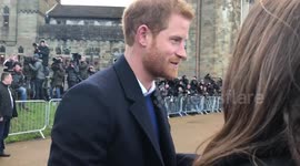 Prince Harry joking about the weather in Cardiff while visiting the city with Meghan Markle