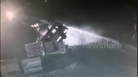 Chilling moment mini-bus falls into river with passengers