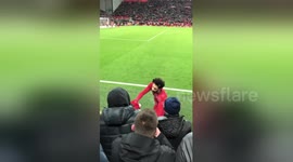Mohamed Salah gives boy his shirt after Spurs match