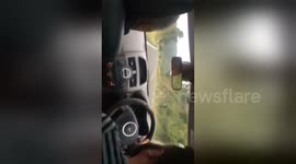 Newsflare Edit - Bored passengers sing 'one man went to mow'